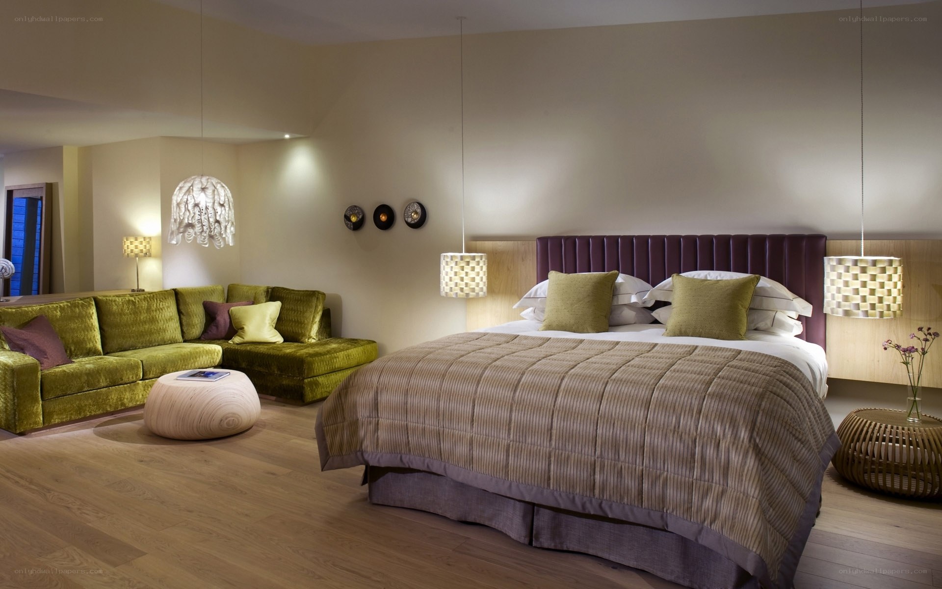 Modern hotel room with green sofa
