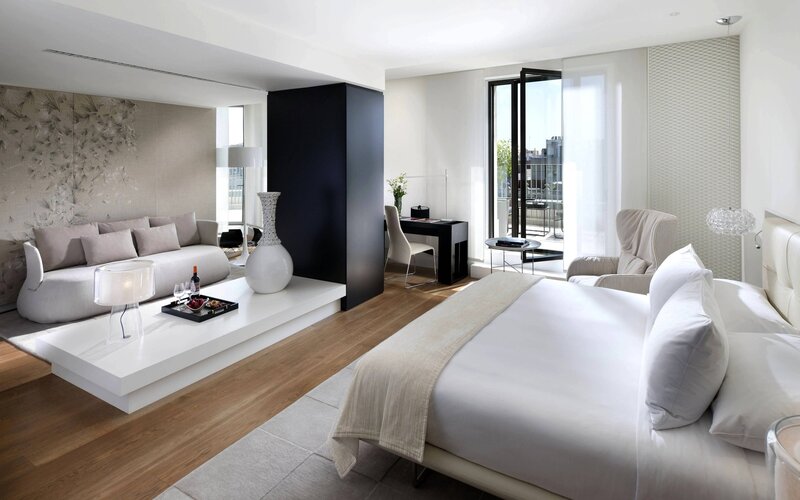 Modern hotel room with living area