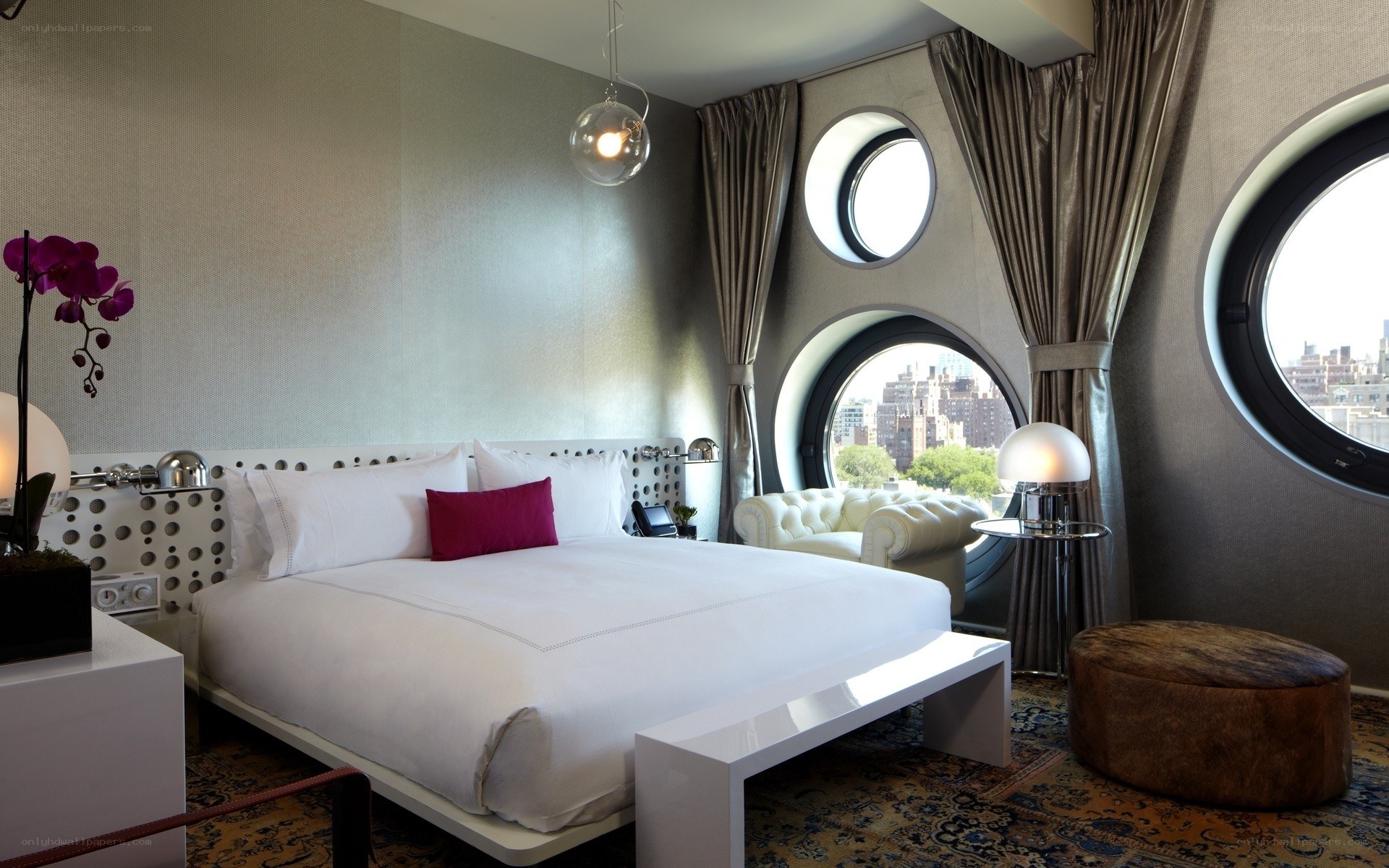 Modern hotel room with round windows