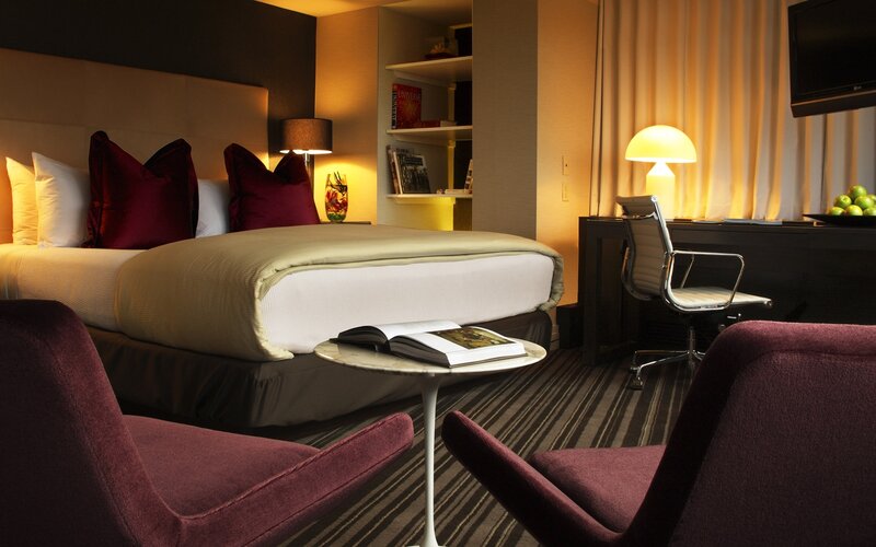 Modern hotel room with seating area
