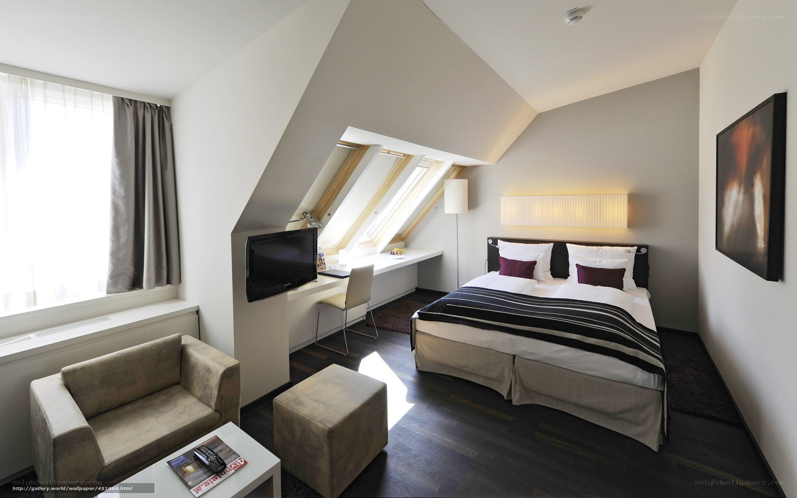 Modern hotel room with sloped ceiling