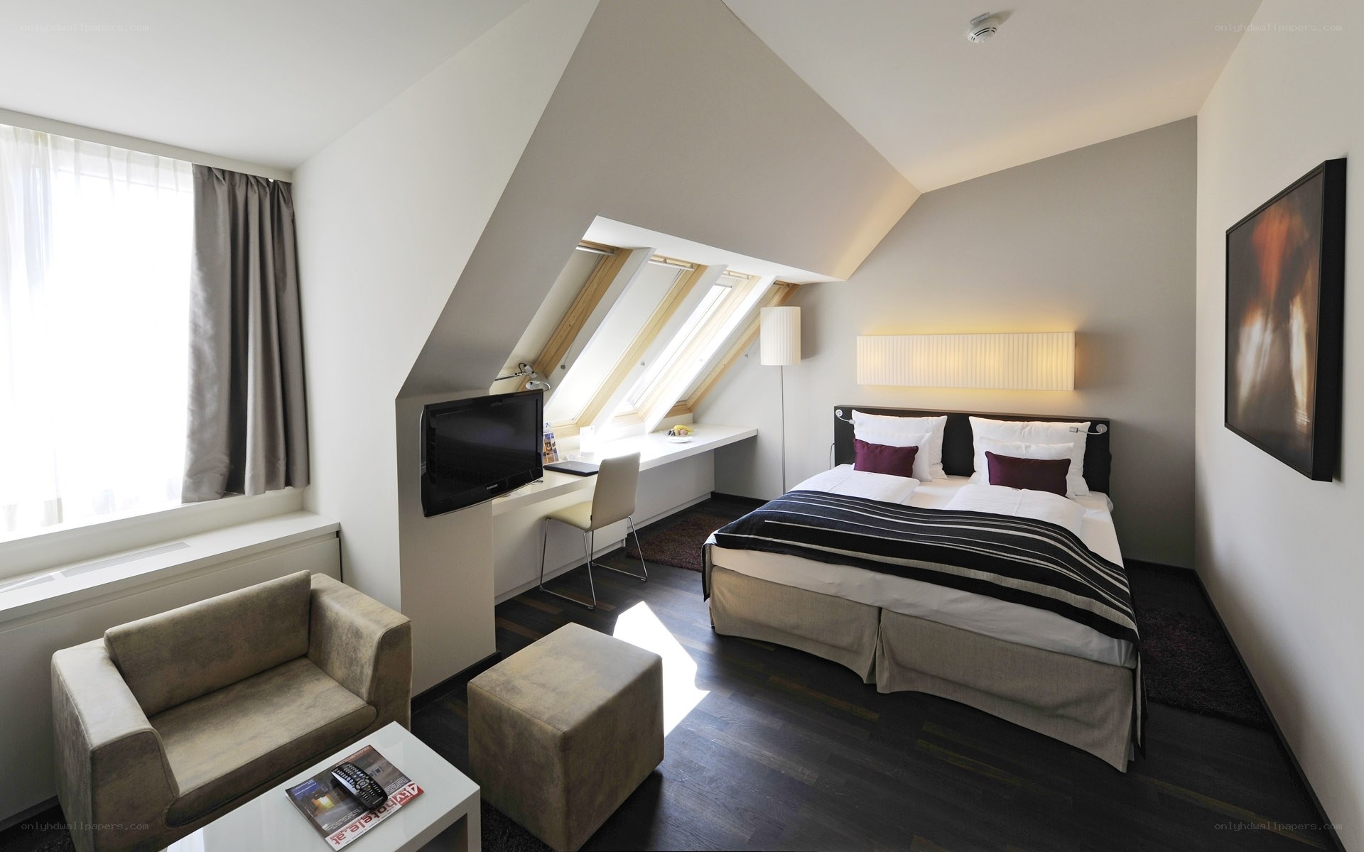 Modern hotel room with sloped ceiling