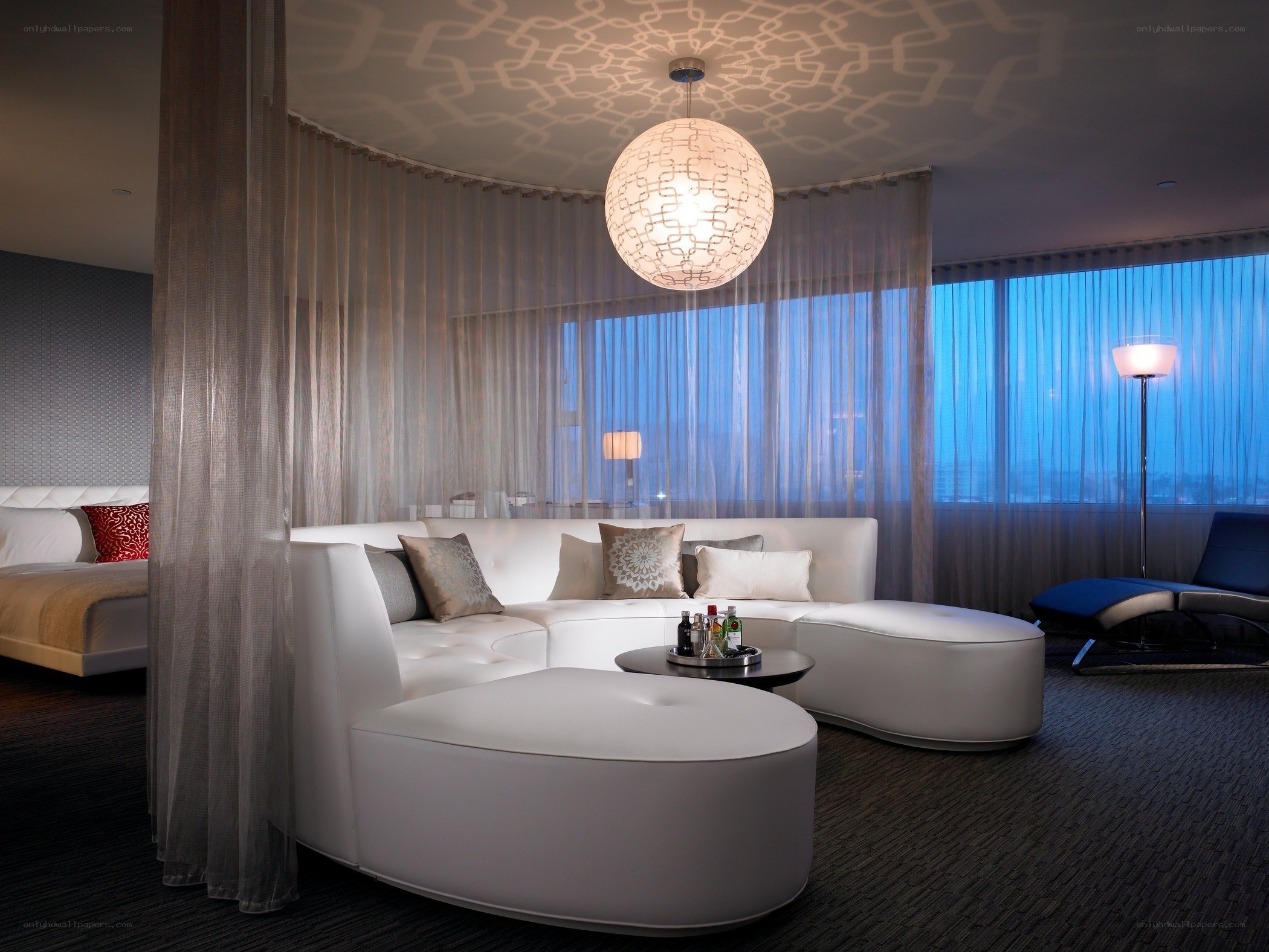 Modern hotel room with white sofa