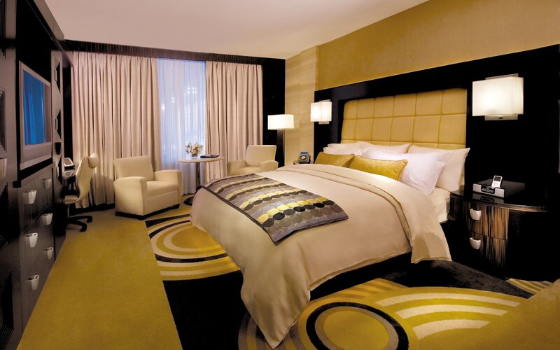 modern hotel room with yellow accents