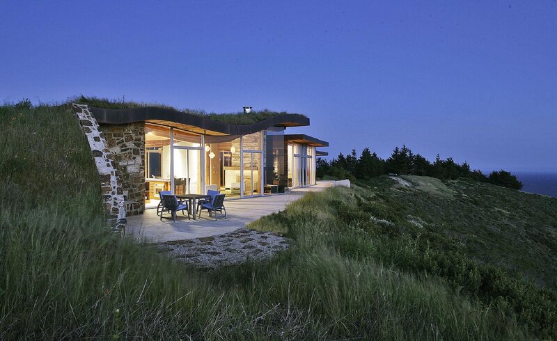 Modern house on a grassy cliff