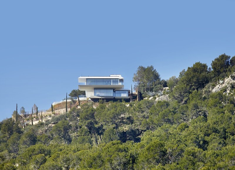 Modern House on Hillside — Green, Serene, Afternoon