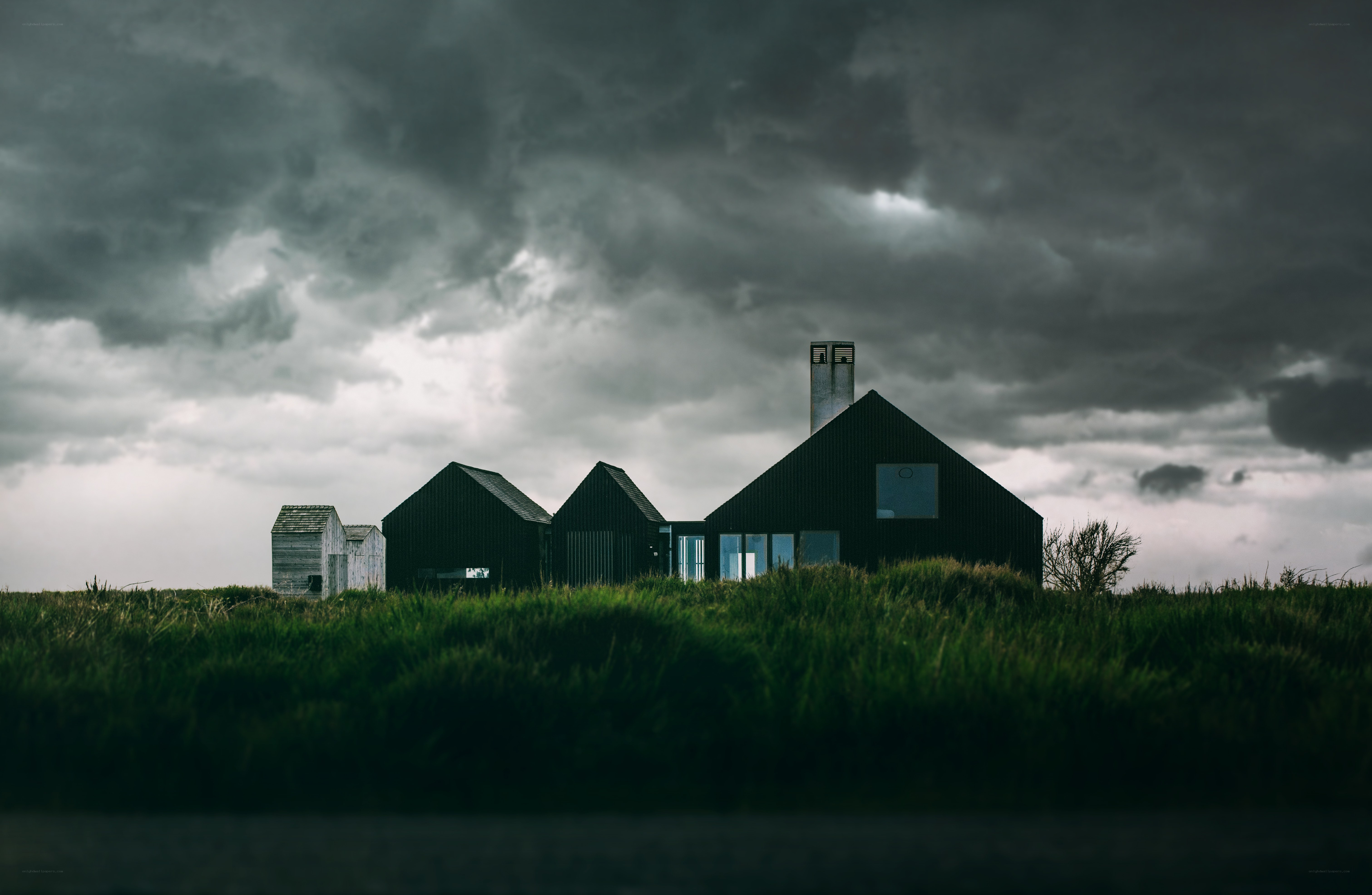 Modern house under stormy sky