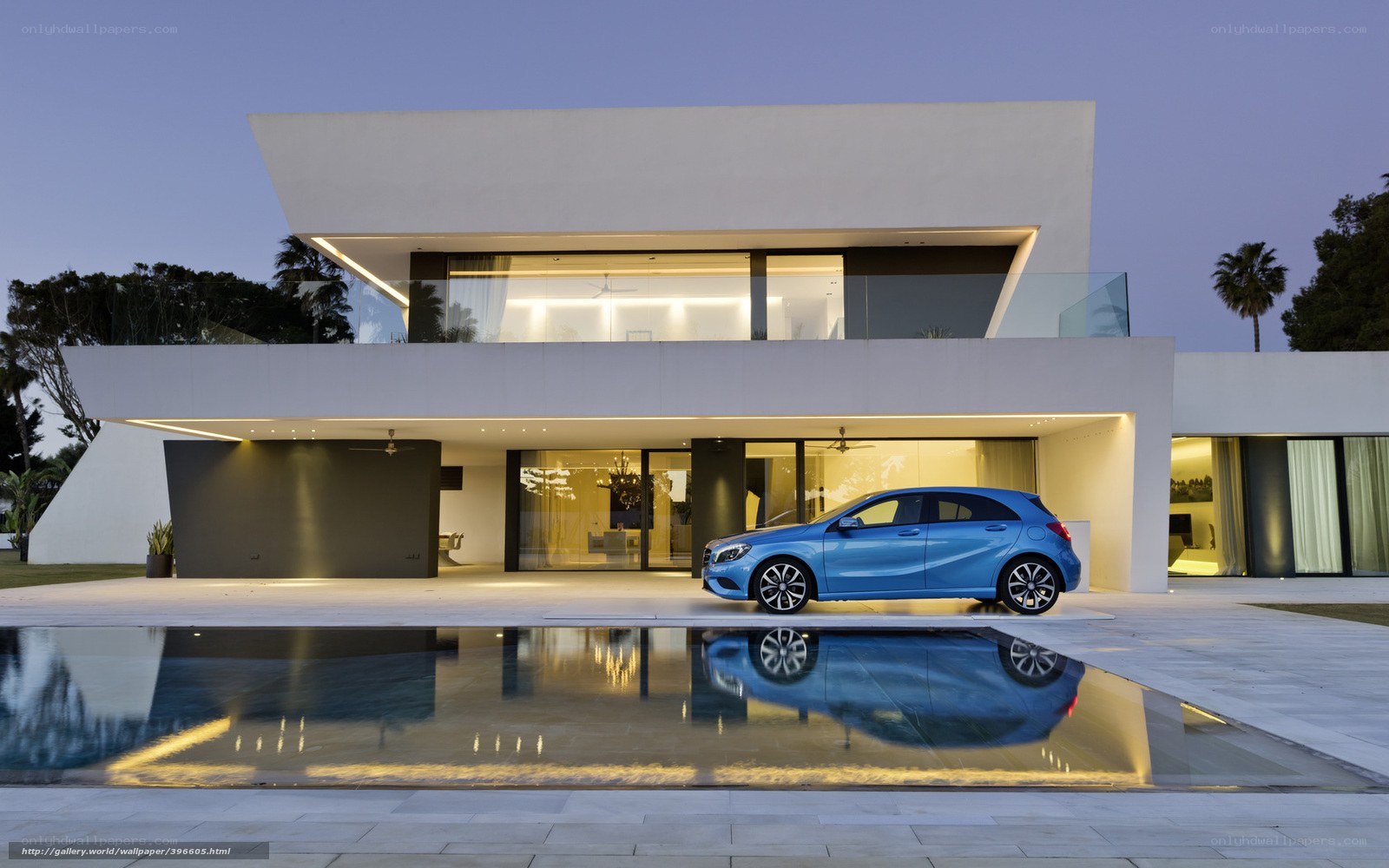 Modern house with blue car