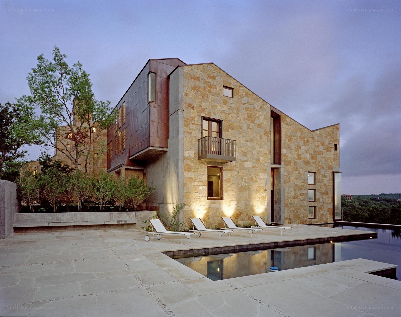 Modern house with pool and stone facade