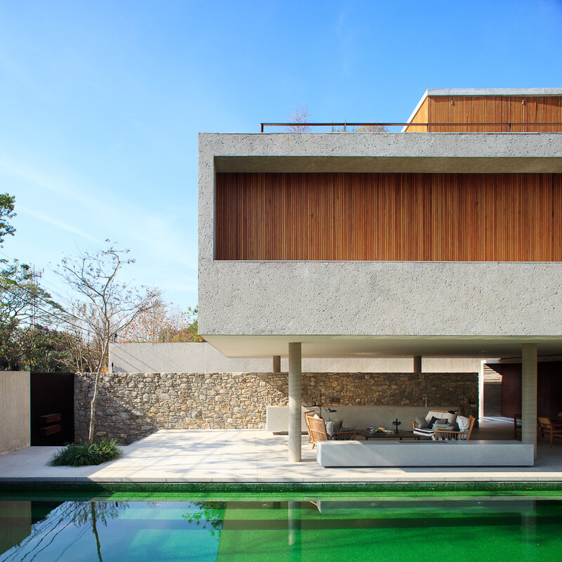 Modern house with pool and wooden facade