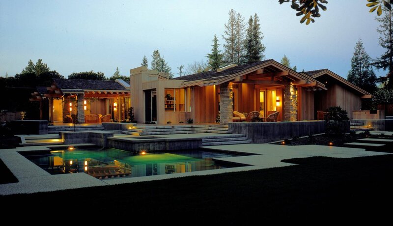 Modern house with pool at dusk