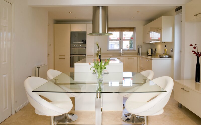 Modern kitchen with glass table