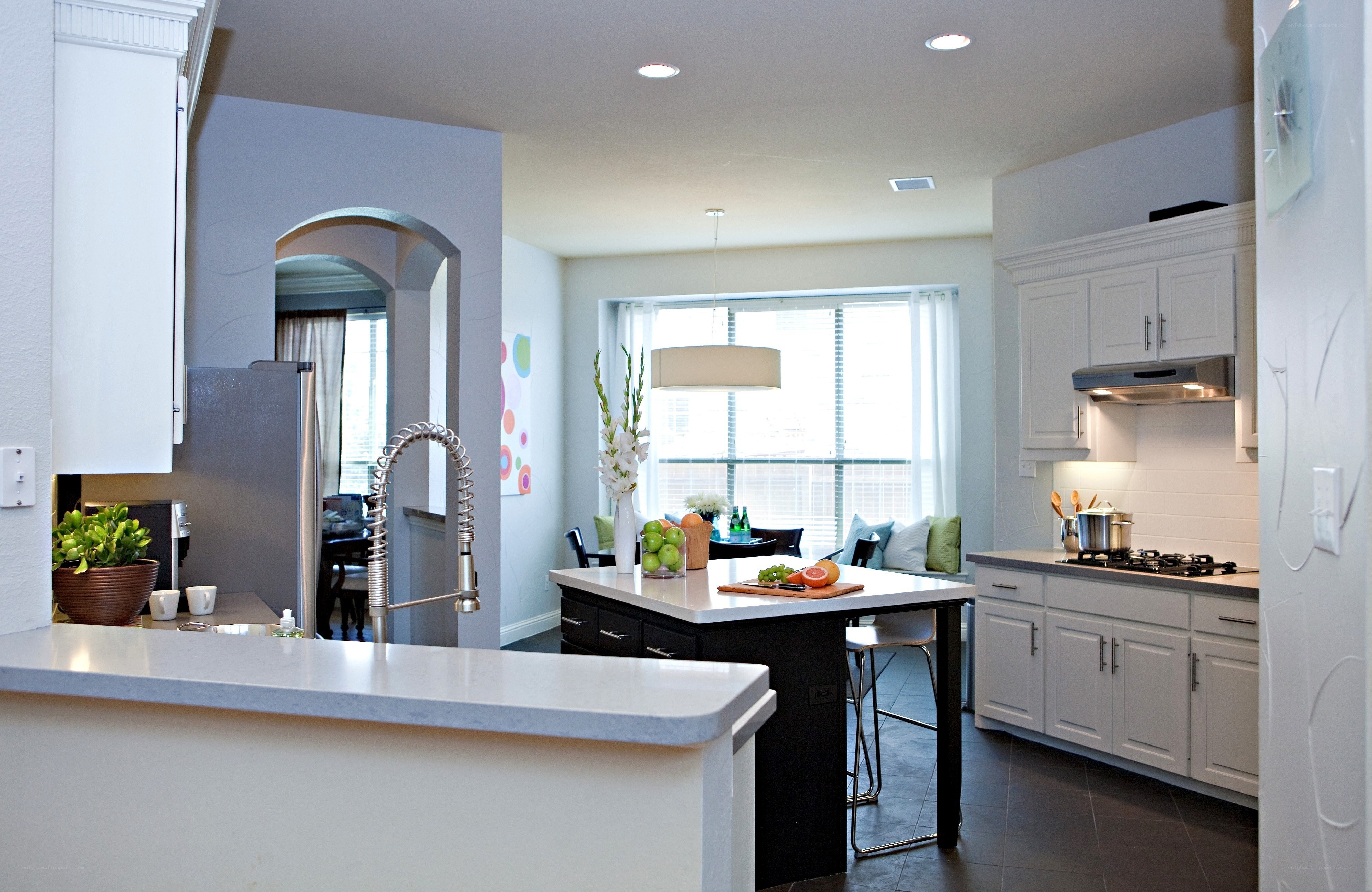 Modern kitchen with island and dining area