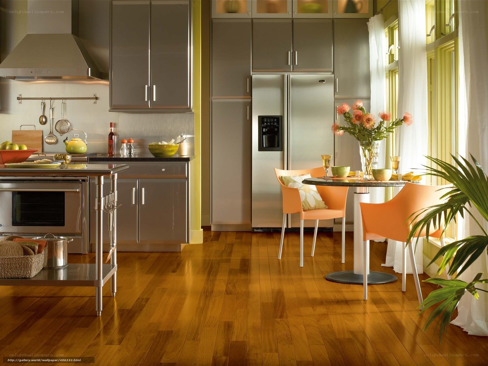 Modern kitchen with orange chairs