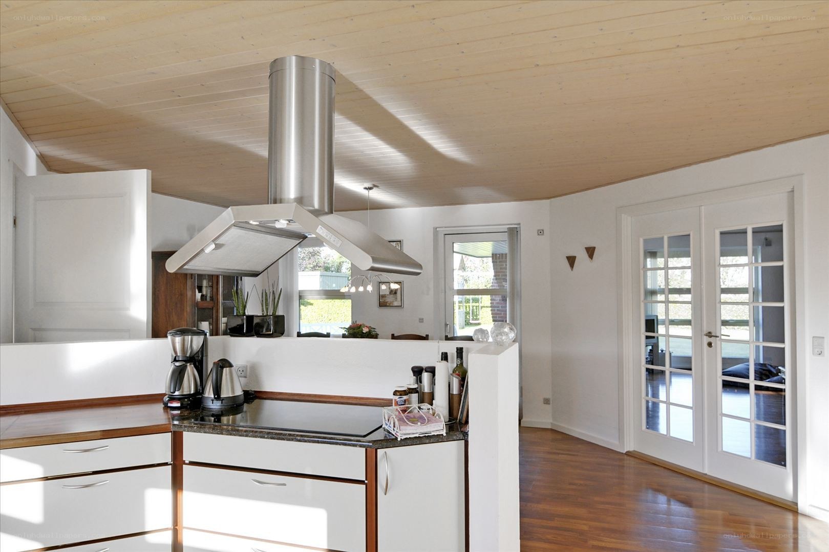 Modern kitchen with wooden ceiling