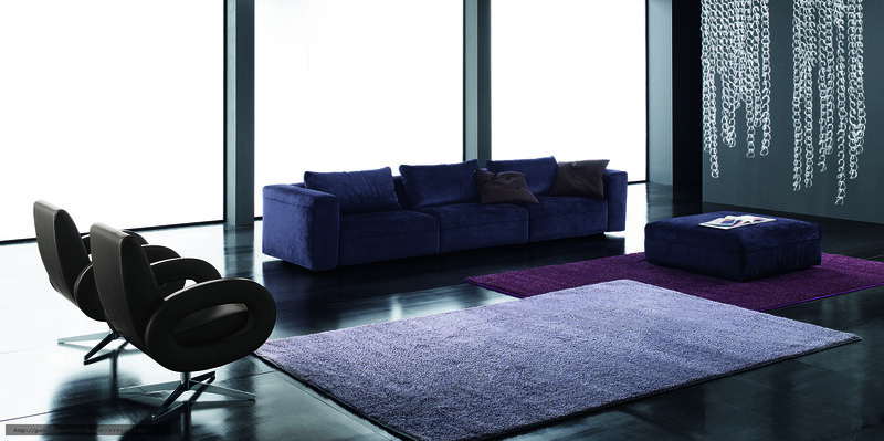 Modern living room with blue sofa