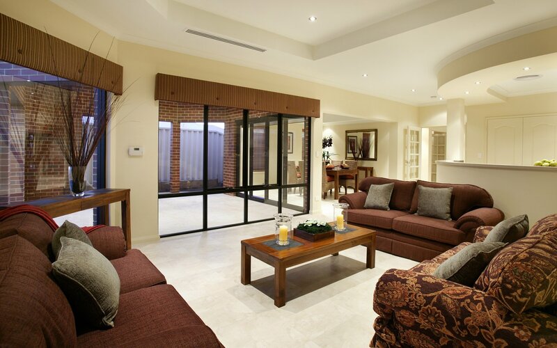 Modern living room with brown sofas