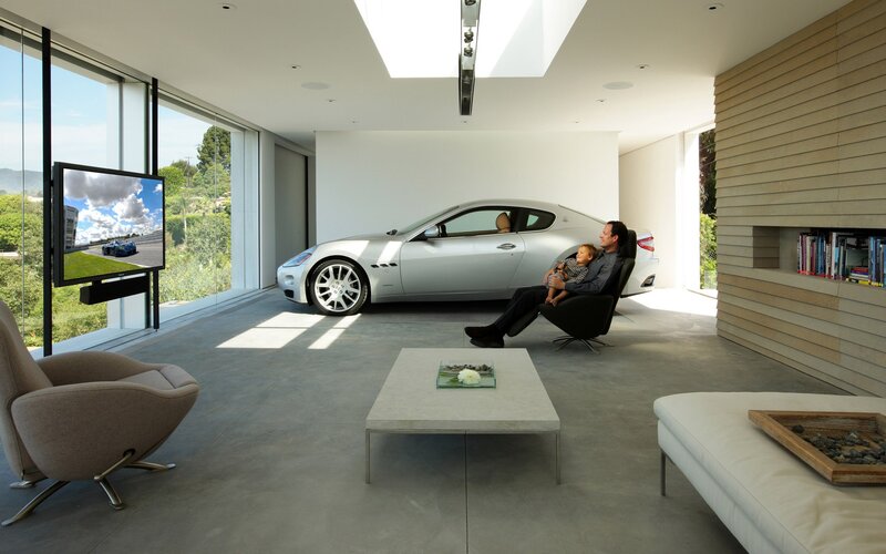 Modern living room with car display