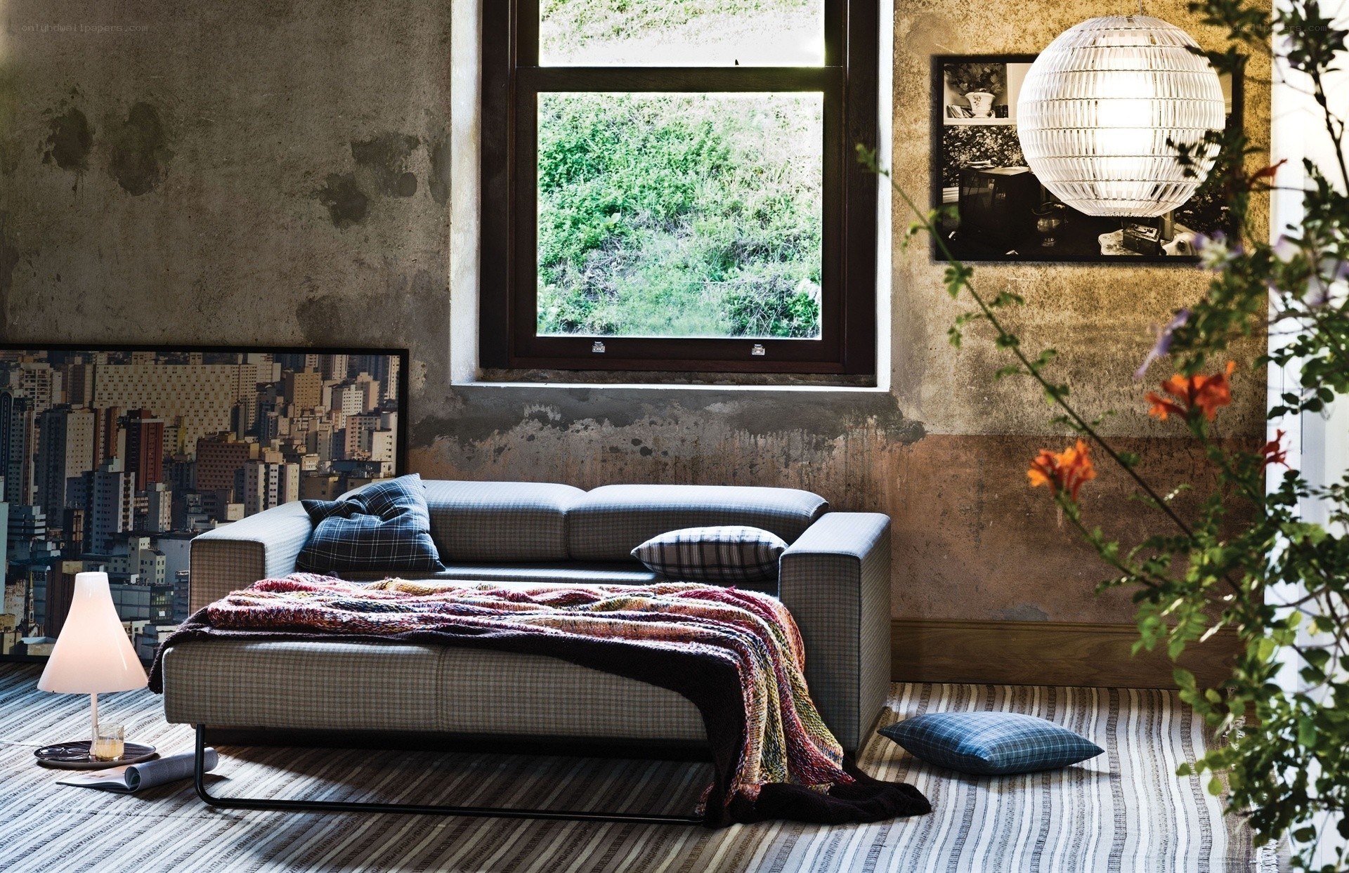Modern living room with city art