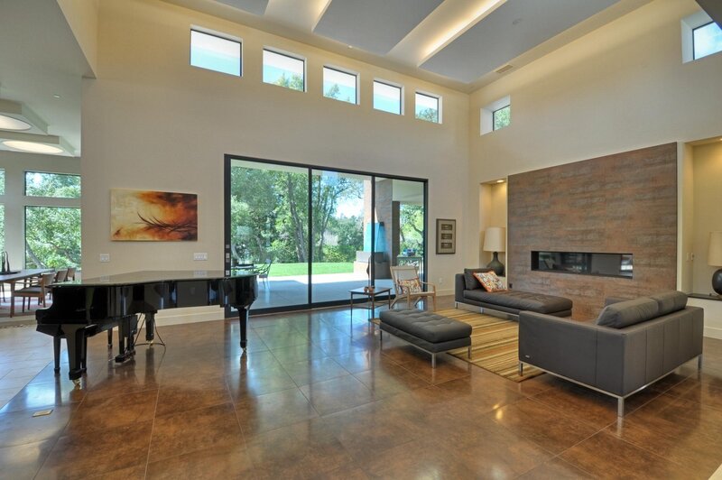 Modern living room with grand piano