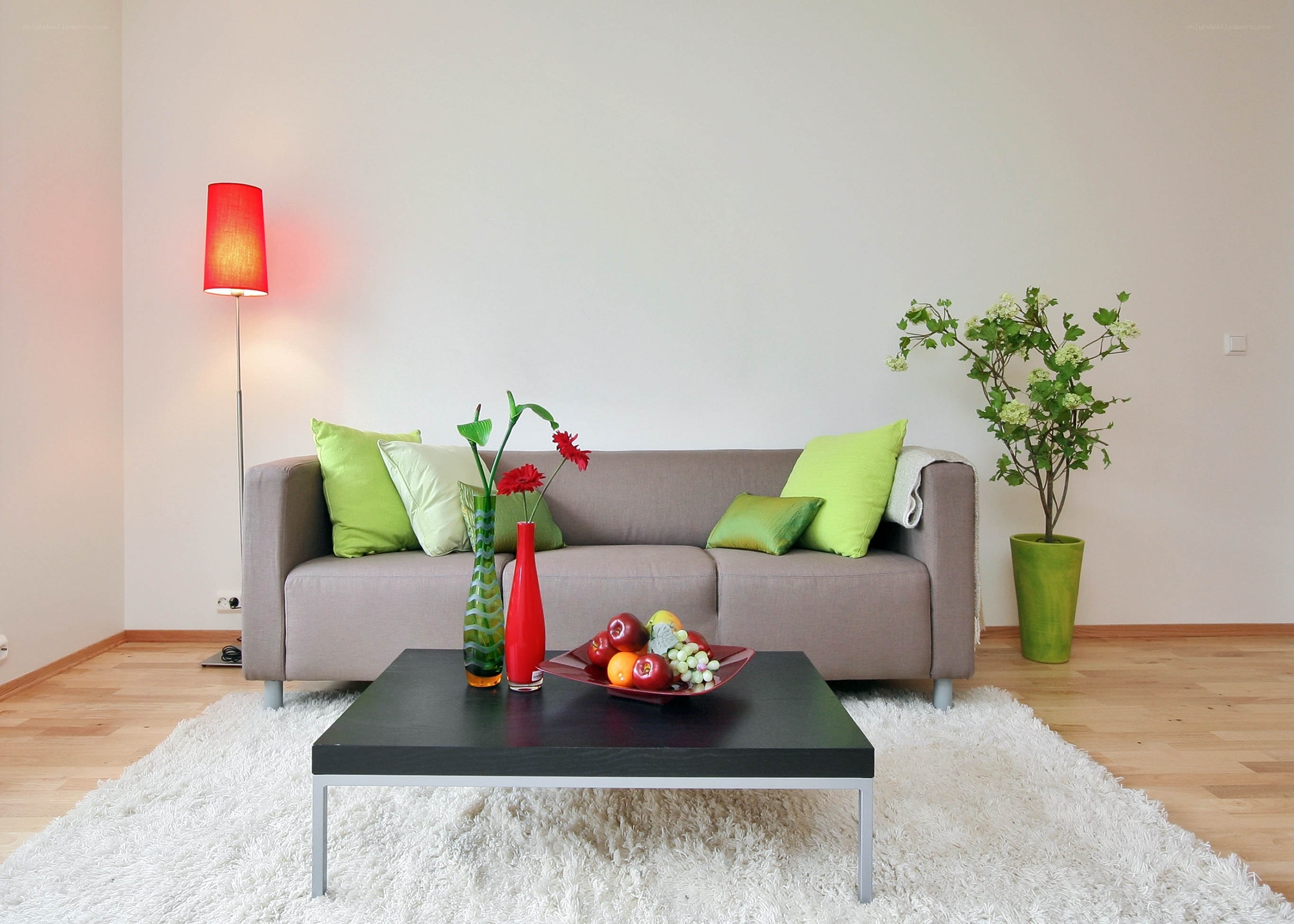 Modern living room with green accents