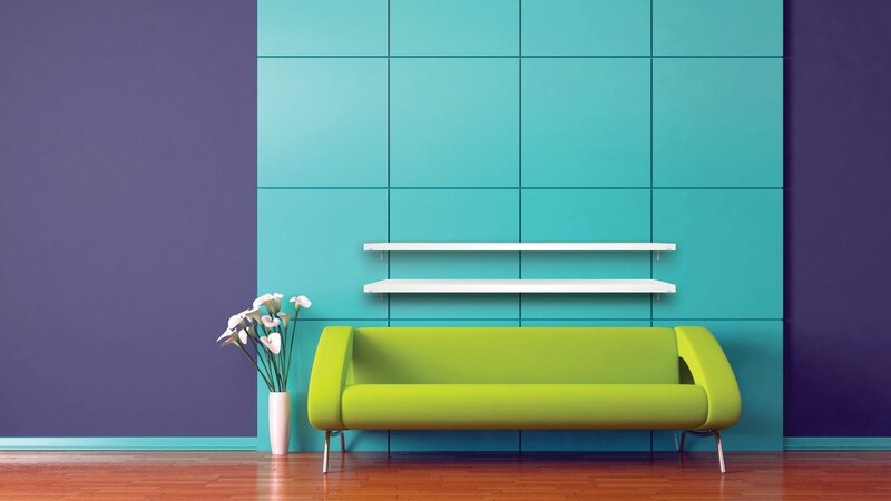 Modern living room with green sofa