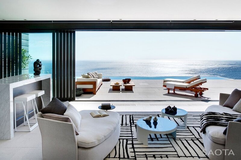 Modern Living Room with Ocean View — White, Serene, Afternoon, Photograph, Sofa, Coffee Table