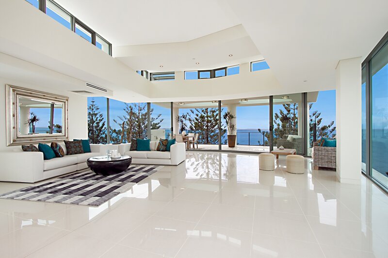 Modern Living Room with Ocean View — White, Serene, Afternoon, Photograph, Sofa