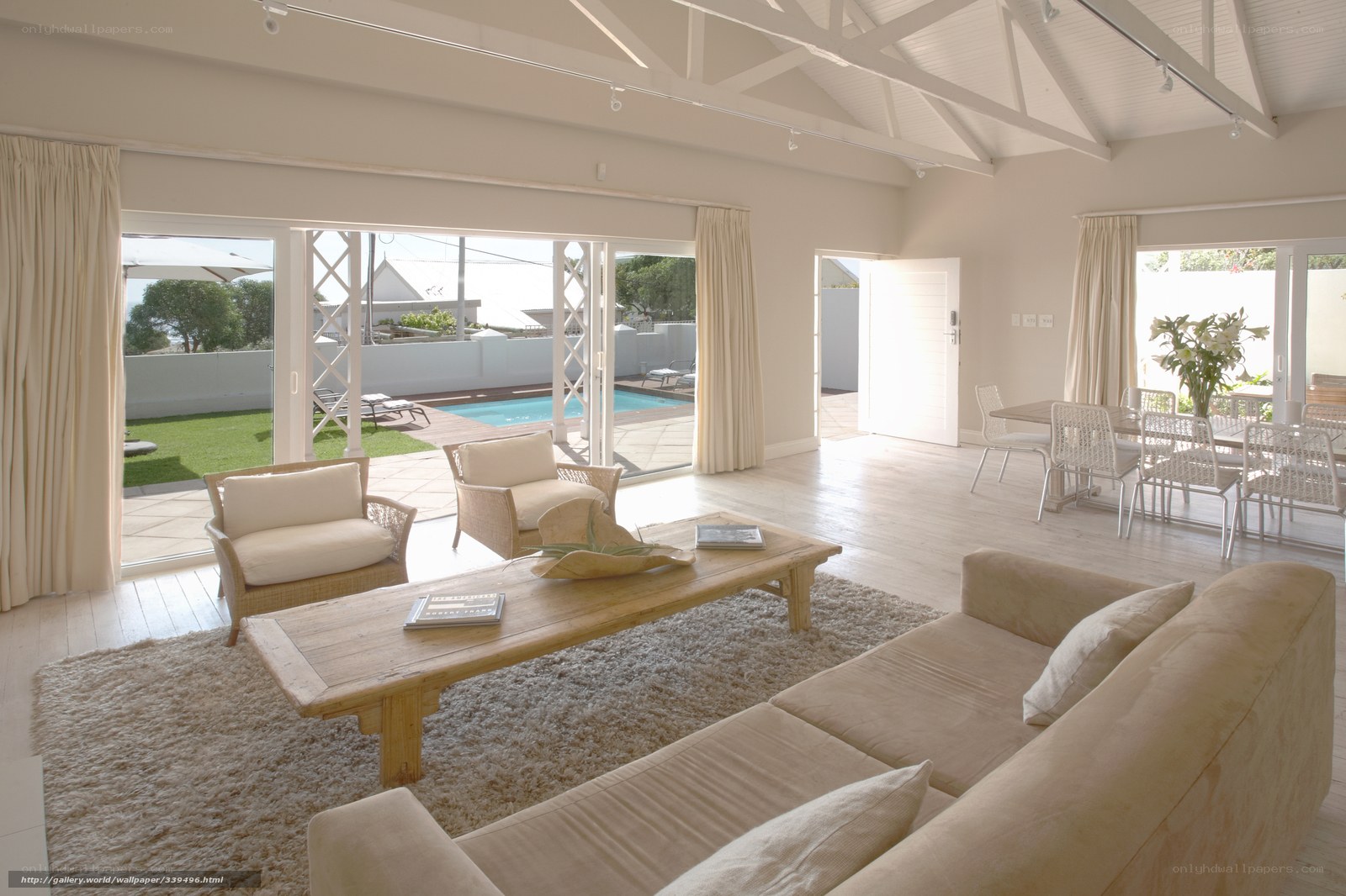 Modern living room with pool view