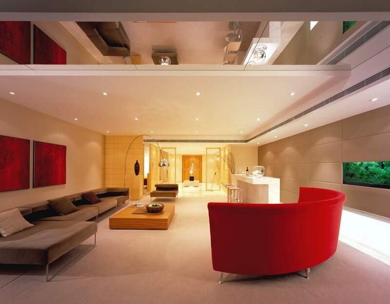 Modern living room with red accents