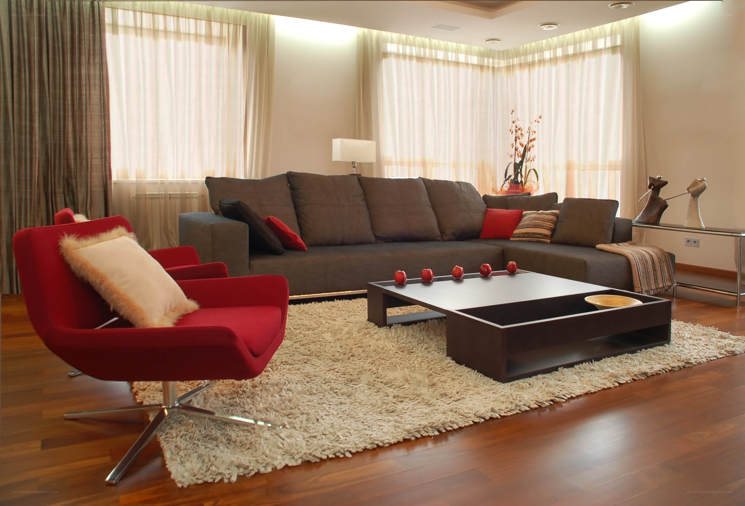 Modern living room with red chair