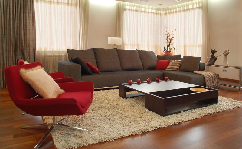 Modern living room with red chair