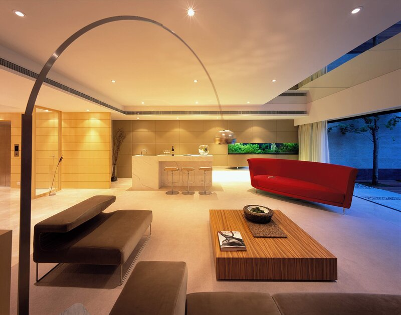 Modern living room with red sofa