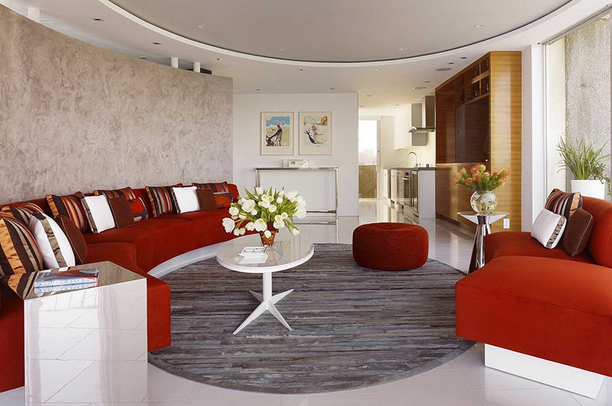 Modern living room with red sofas