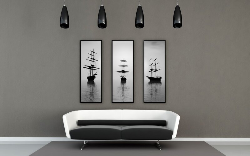 Modern living room with sailboat art