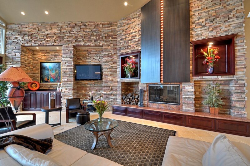 Modern living room with stone fireplace