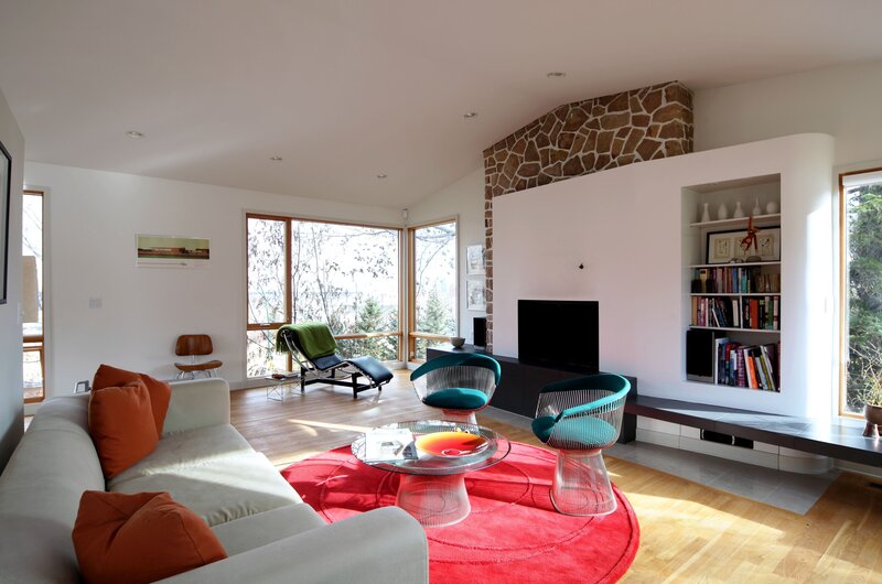 Modern living room with stone fireplace