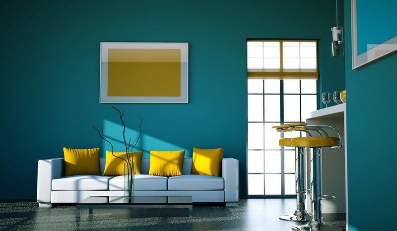 Modern living room with teal walls
