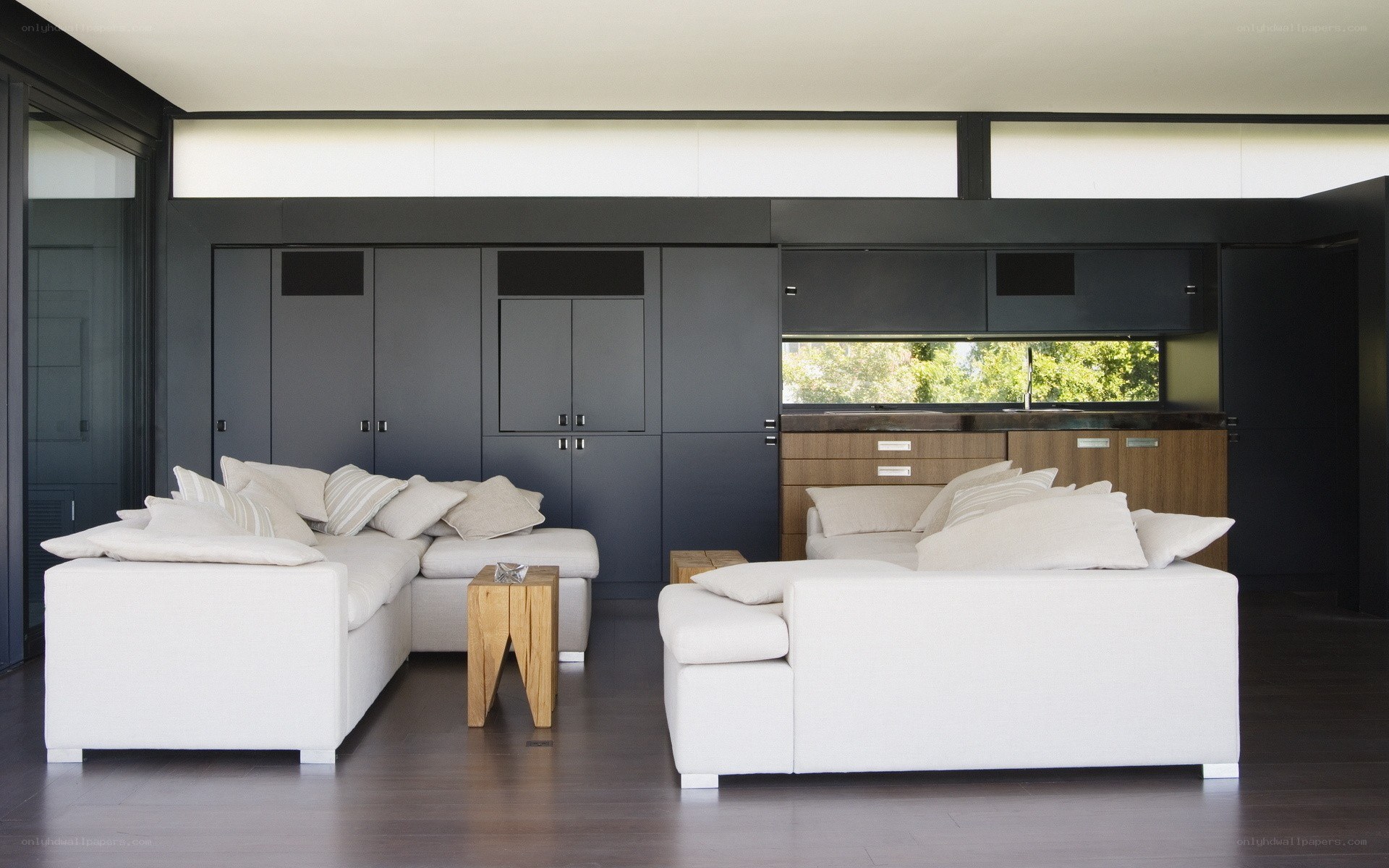 Modern living room with white sofas