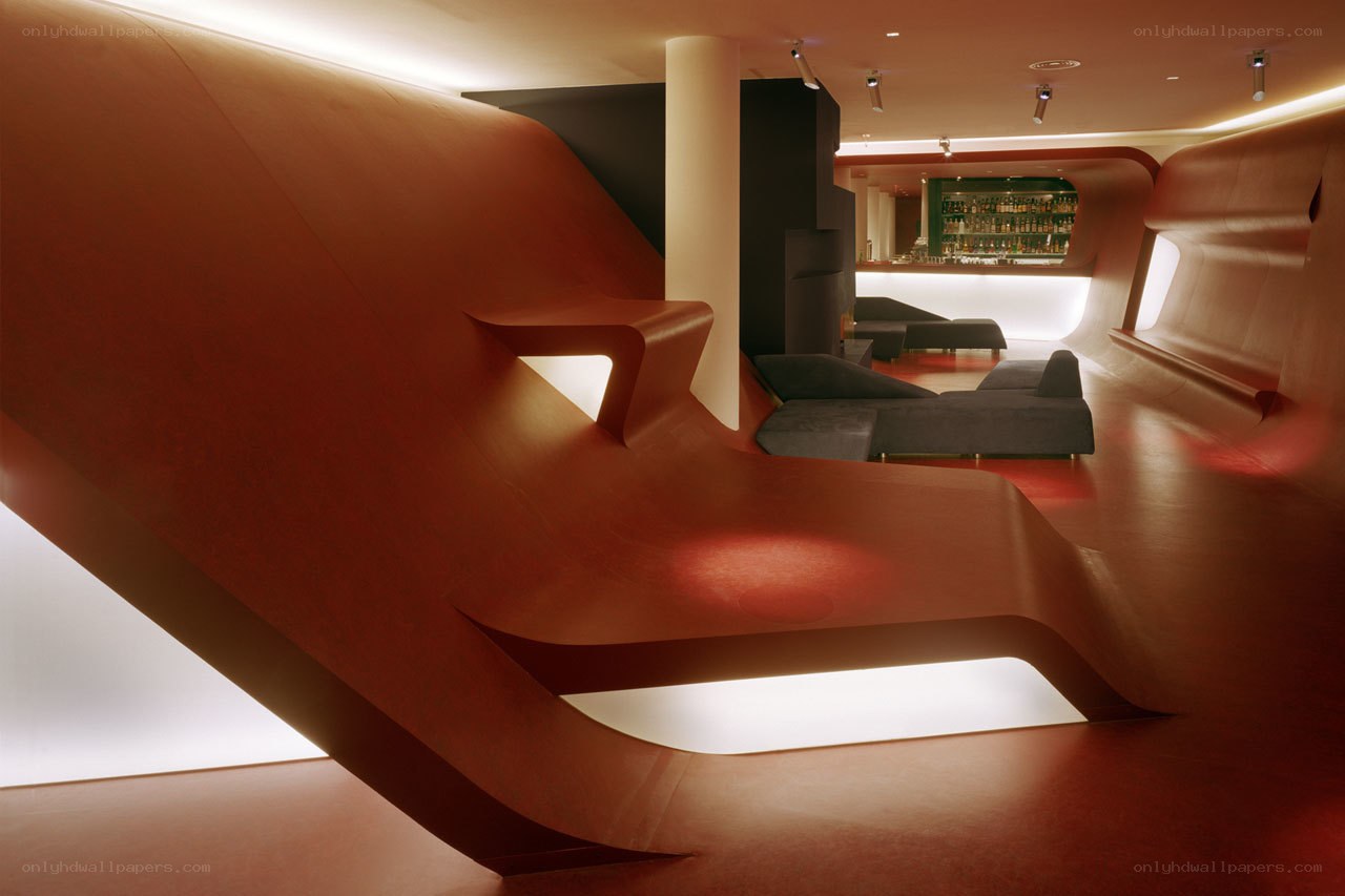Modern lounge with curved red seating