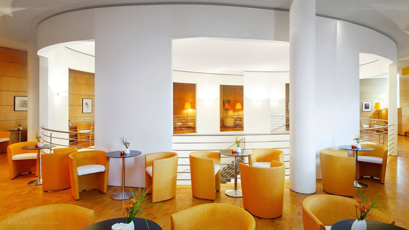Modern lounge with orange chairs