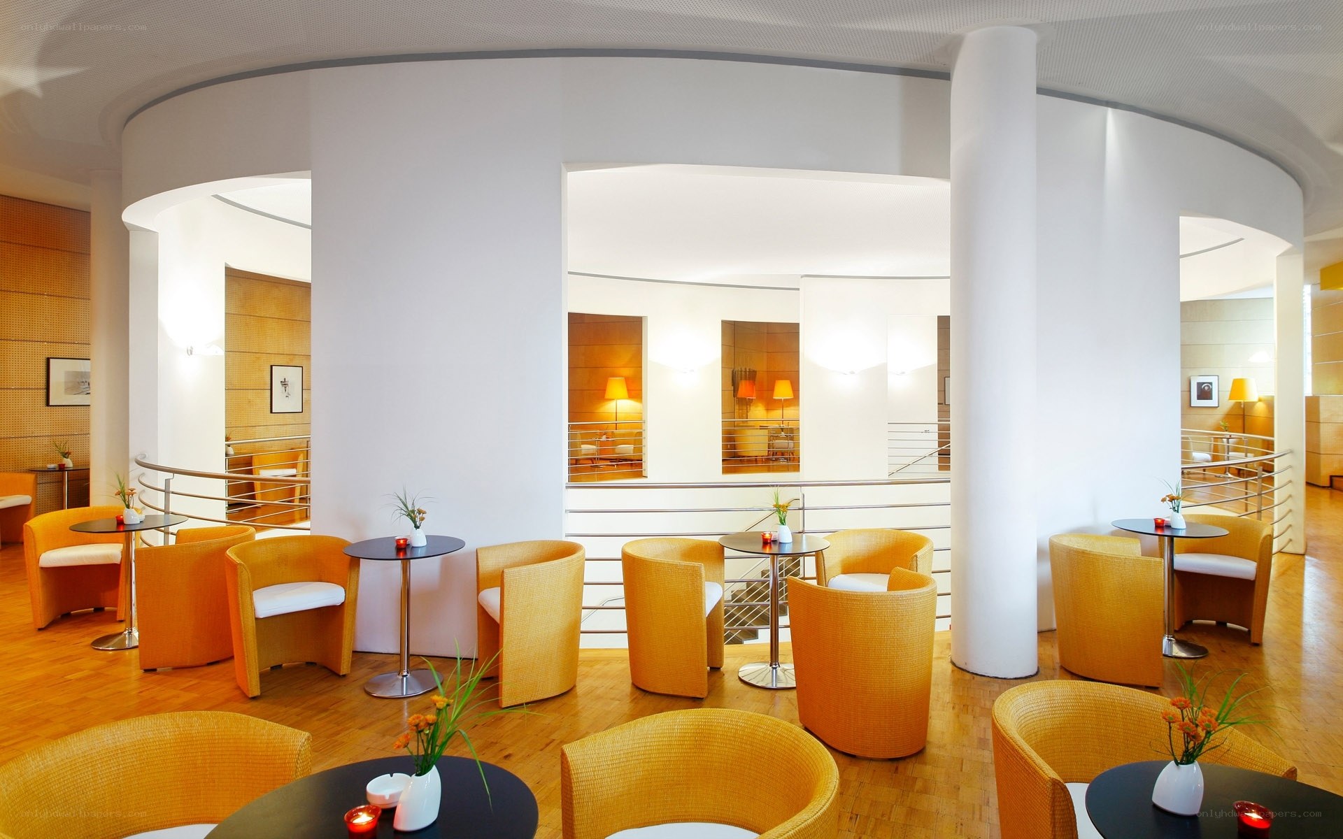 Modern lounge with orange chairs