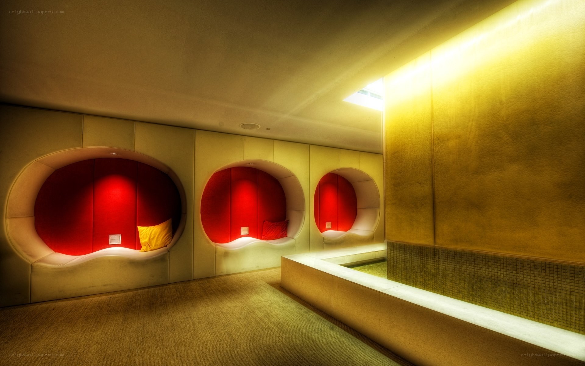 Modern lounge with red alcoves