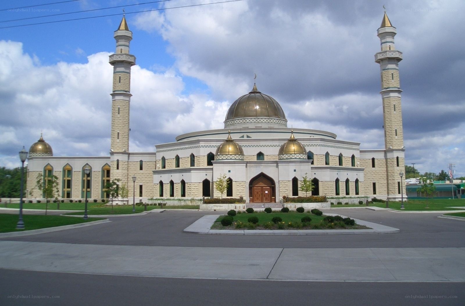 modern mosque with golden domes