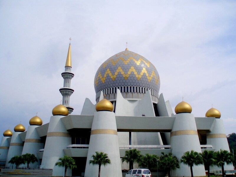 modern mosque with golden domes