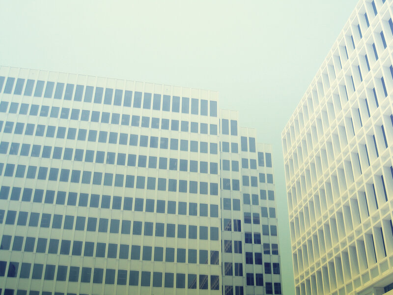 Modern office buildings in fog