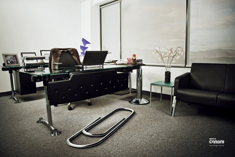 Modern office with giant paperclip