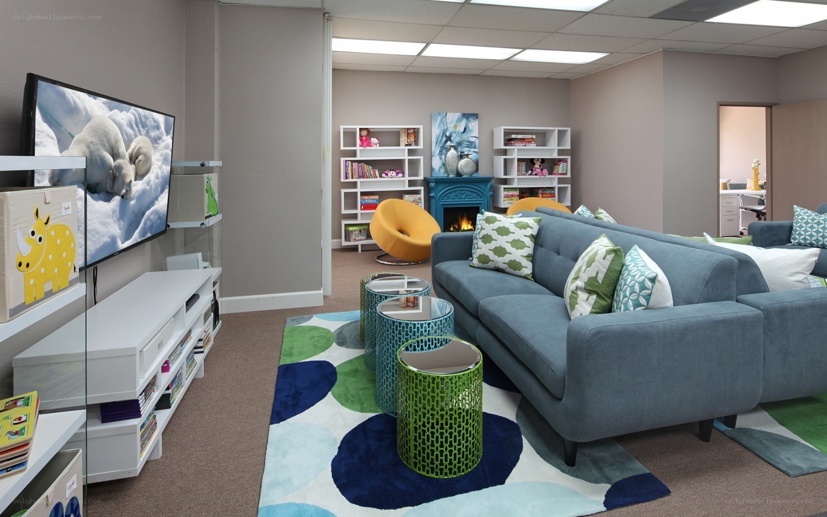 Modern playroom with blue sofa