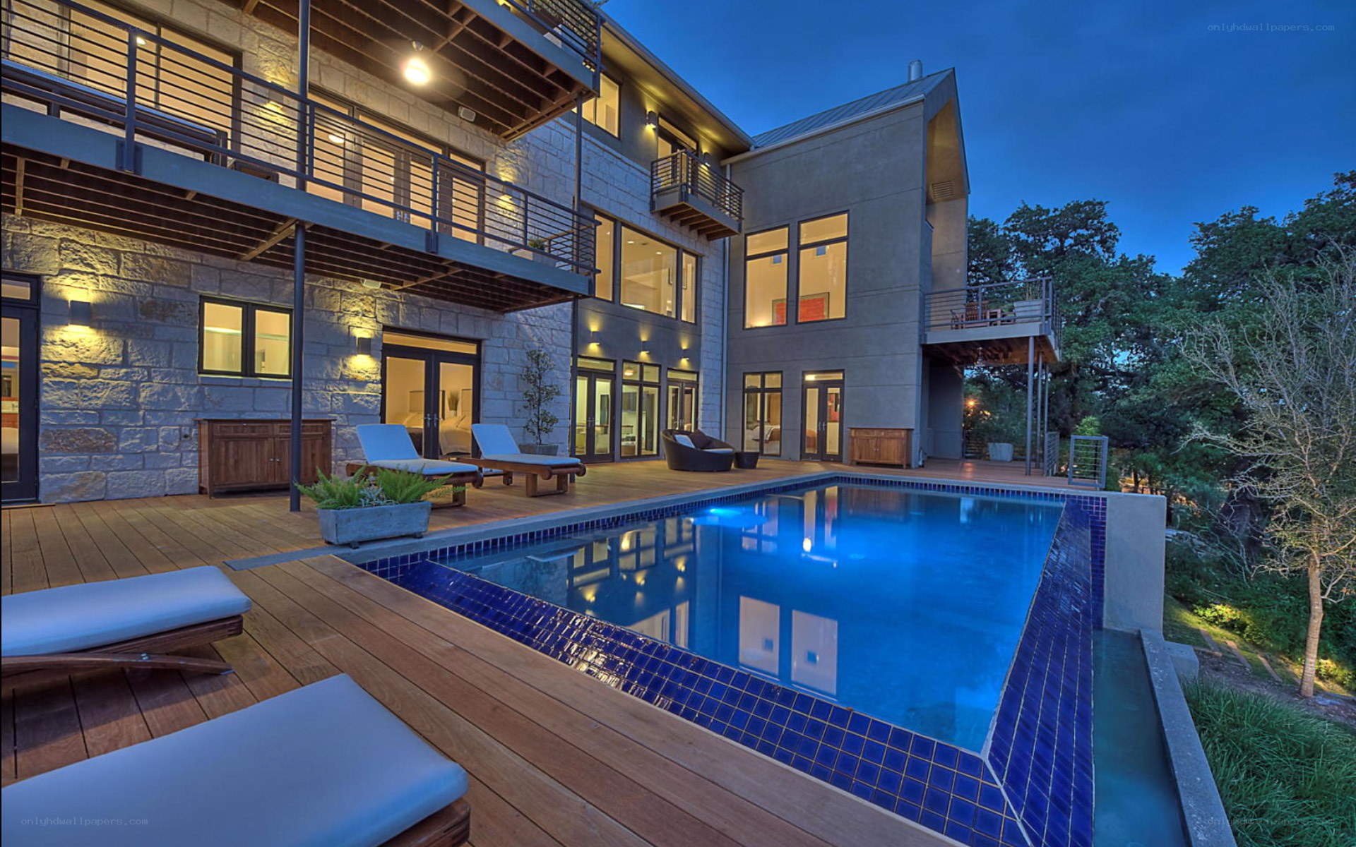 Modern pool house at dusk