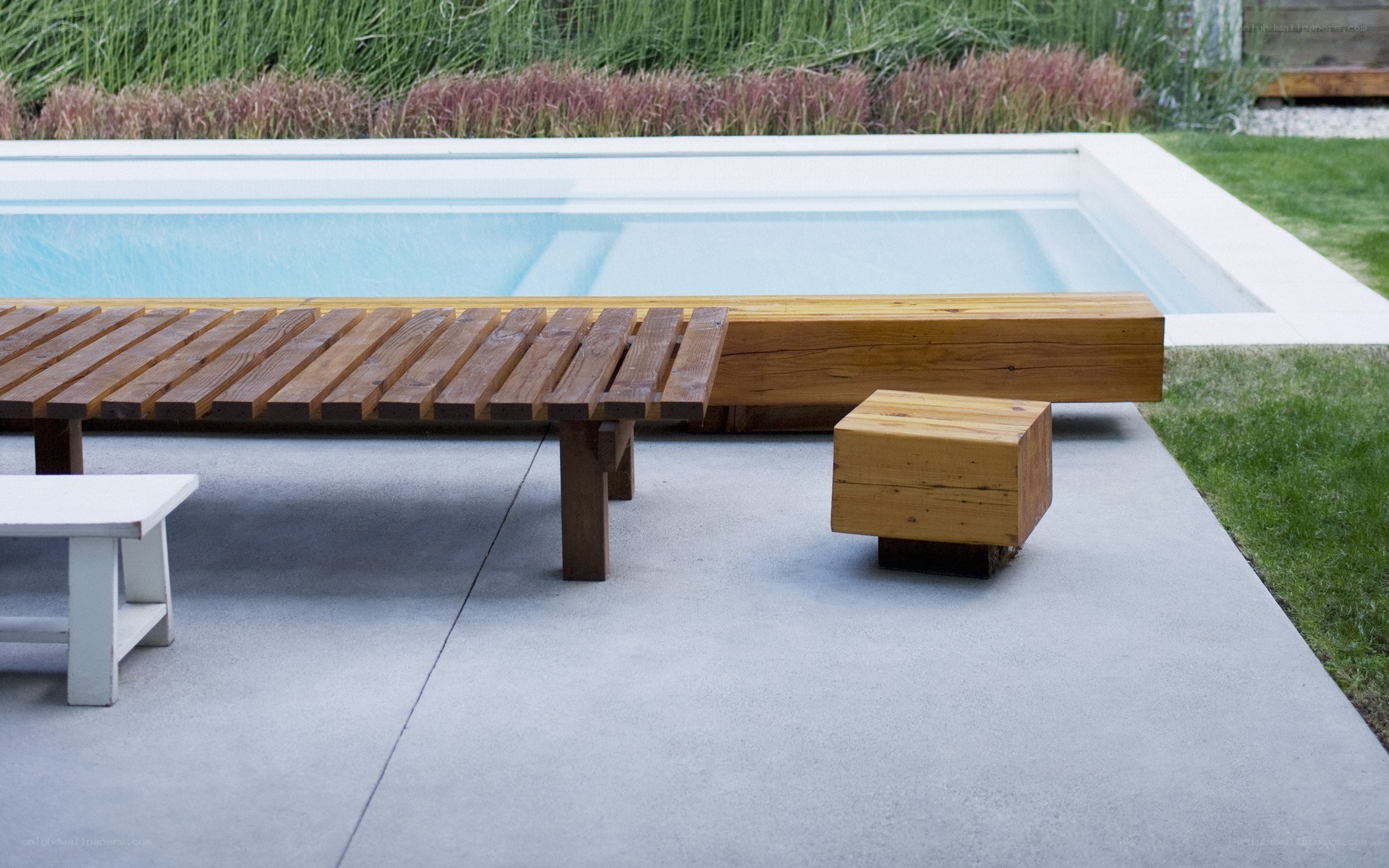 Modern poolside lounge area